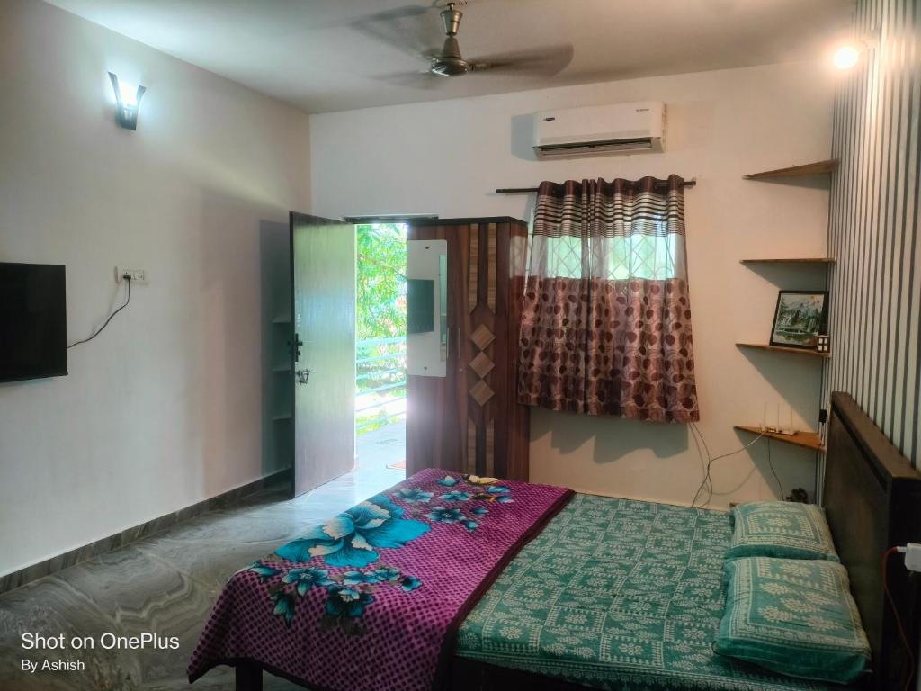 Ένα ή περισσότερα κρεβάτια σε δωμάτιο στο Your home away from your home