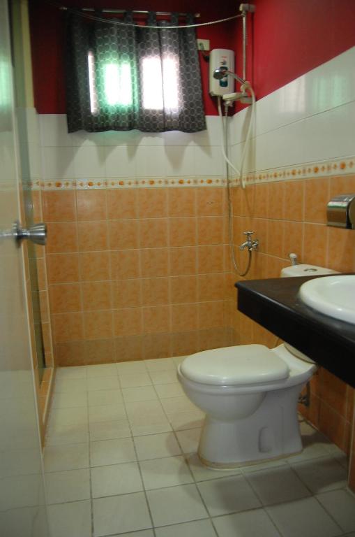 Koupelna v ubytování Rumi Apartelle Hotel