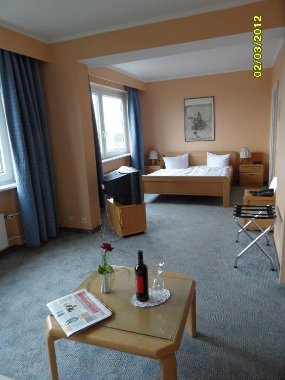 Postel nebo postele na pokoji v ubytování Wiking Hotel