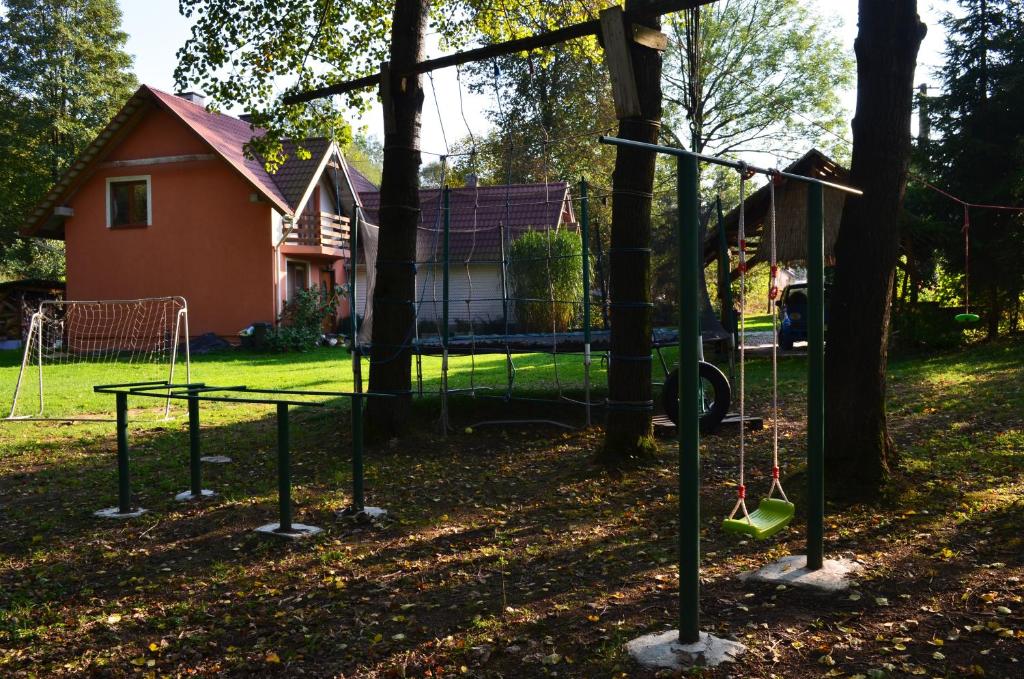 Vonkajšia záhrada v ubytovaní Rodzinny Domek Apartament