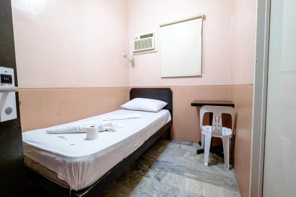 Postel nebo postele na pokoji v ubytování GV Hotel - Ozamiz