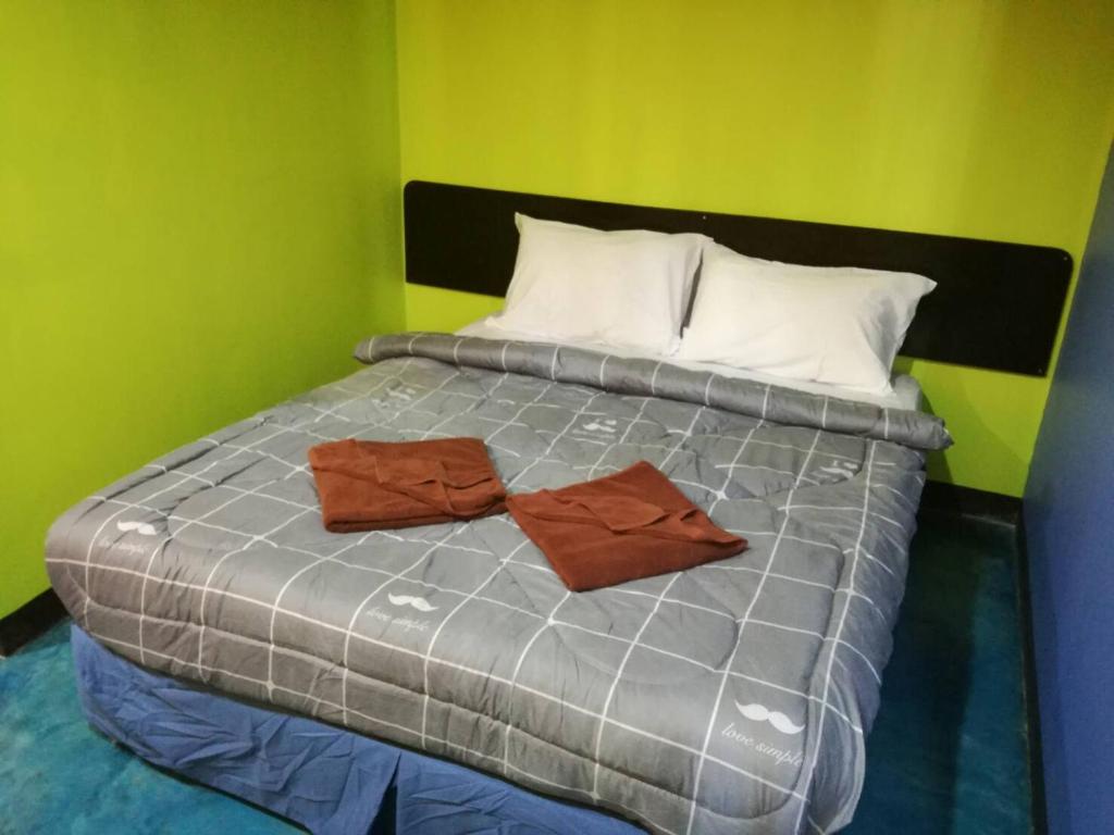 Postel nebo postele na pokoji v ubytování Rc Guest House