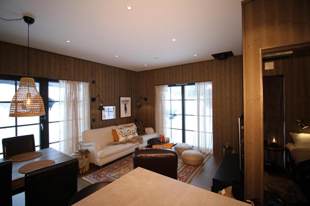 Giường trong phòng chung tại Fjällbäcken Pool and Padel