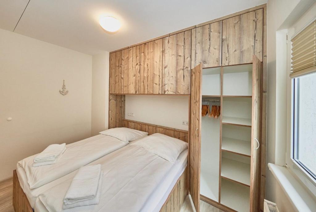 Postel nebo postele na pokoji v ubytování Pamir - 20