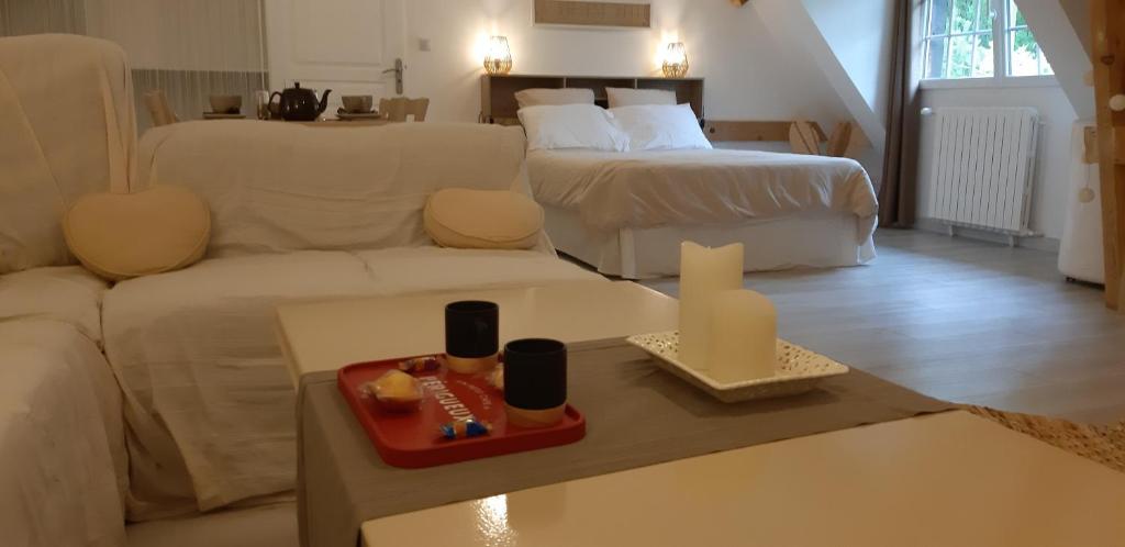 Postel nebo postele na pokoji v ubytování Suite Maraval Chez L'habitant