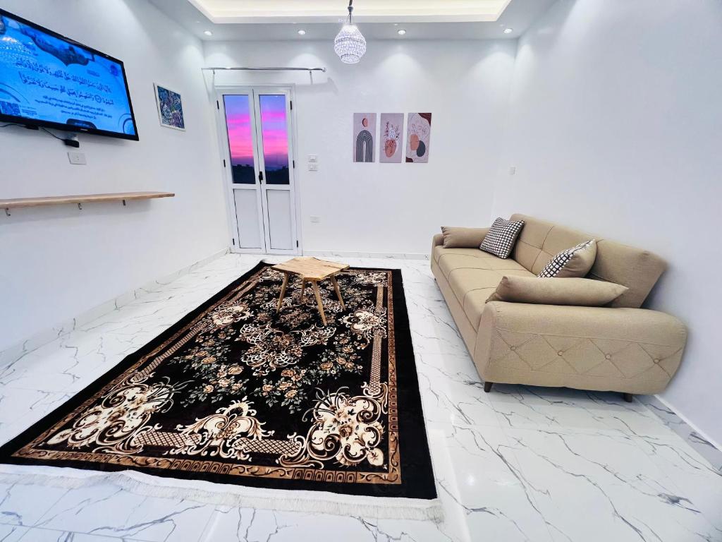 TV a/nebo společenská místnost v ubytování Muhammad Ali House