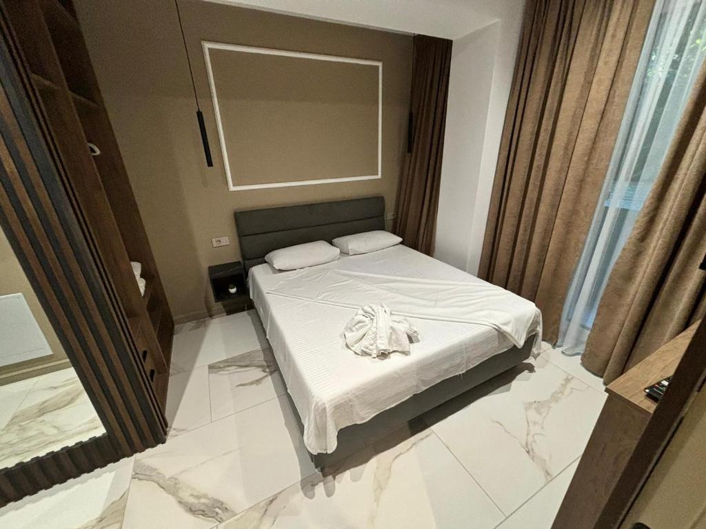 Giường trong phòng chung tại Zlata Vuia Loft Apartments 14