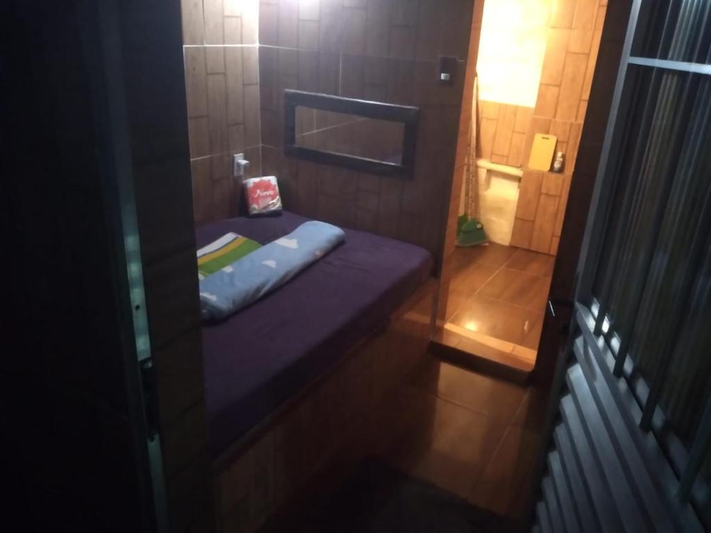 Ένα ή περισσότερα κρεβάτια σε δωμάτιο στο Suíte Love