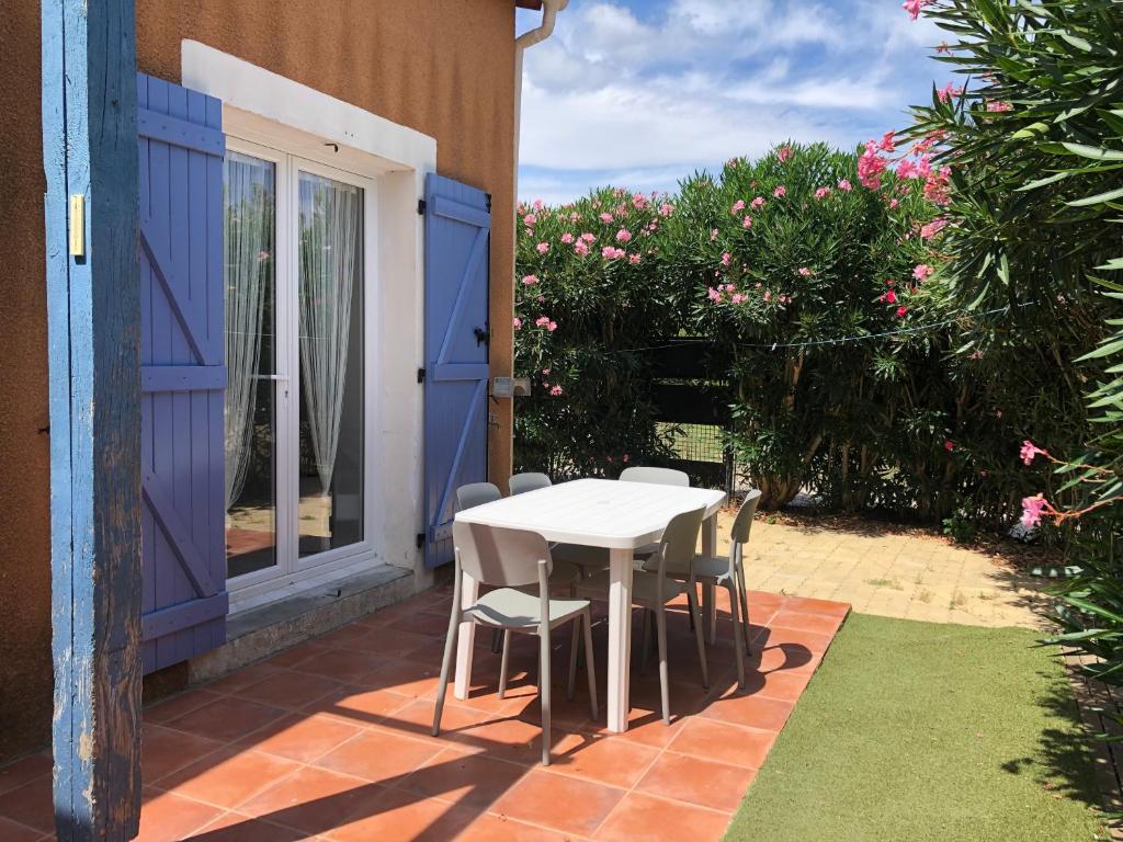 En have udenfor Maison au bord de mer