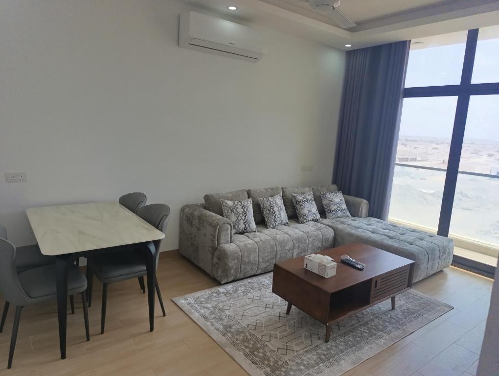 Posezení v ubytování Flat Next to Muscat Mall