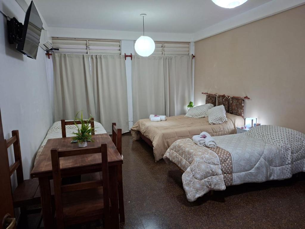 En eller flere senge i et værelse på Sumaï