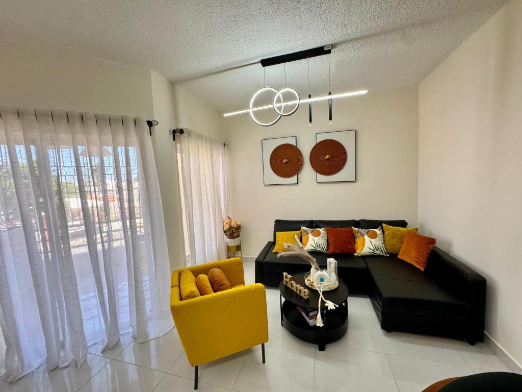 Posezení v ubytování Your ideal escape in Puerto Plata Beach and fun