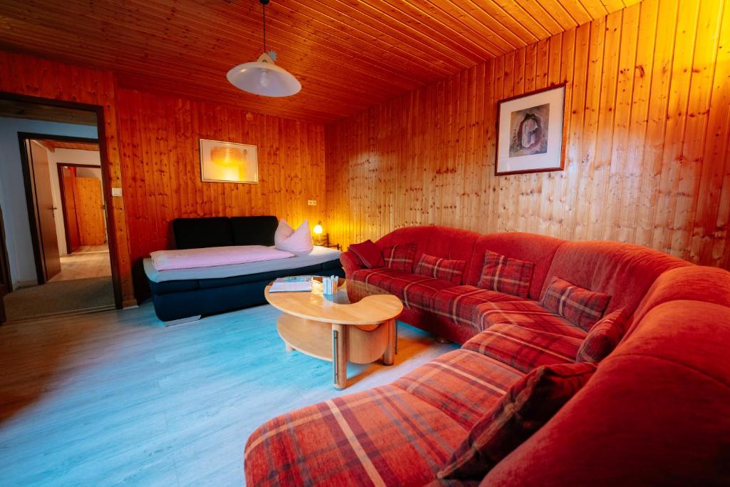 En eller flere senge i et værelse på Apartments Carmen-Braunlage