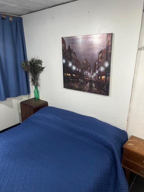 Postel nebo postele na pokoji v ubytování Pequeño depto, wifi, cochera, asador y cocina