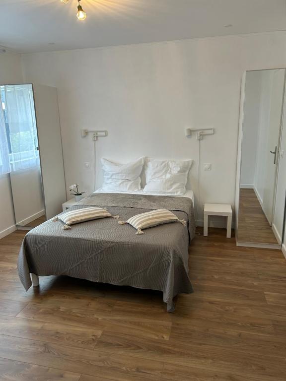 En eller flere senge i et værelse på La maisonette,Thionville-centre