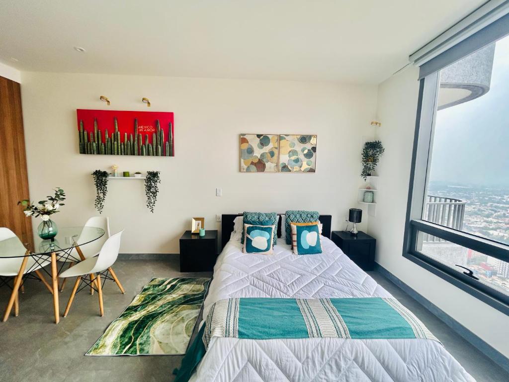 Postel nebo postele na pokoji v ubytování Loft Reforma Embassy USA