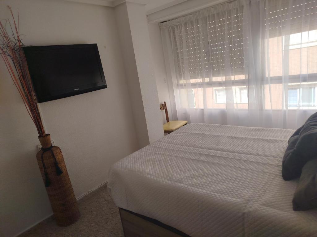 Postel nebo postele na pokoji v ubytování Apartamento junto al Club Nautico