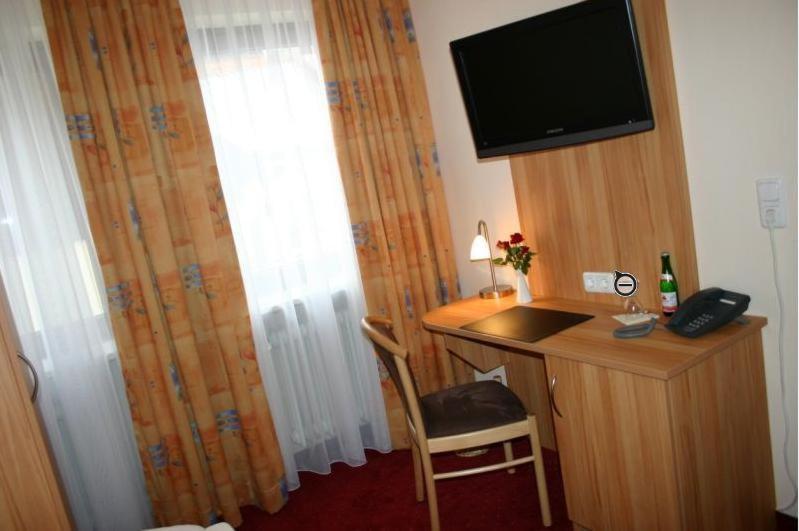 TV a/nebo společenská místnost v ubytování Hotel Accolo