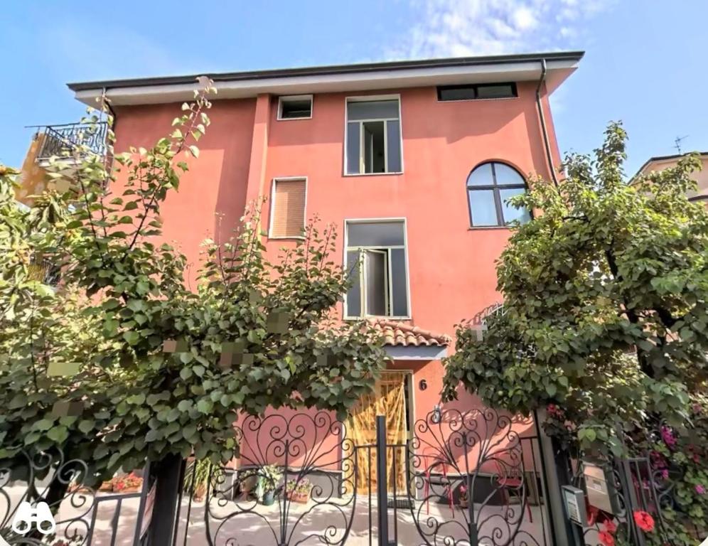 a house with a gate in front of it at Domus Maris in Marina di Ascea