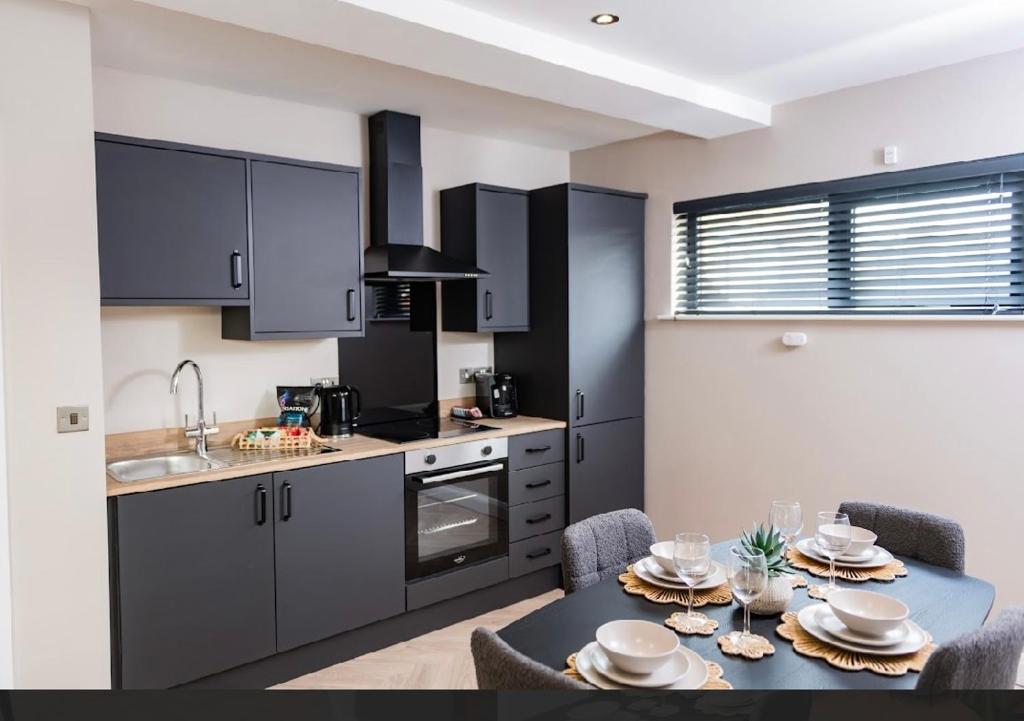 Nhà bếp/bếp nhỏ tại Penthouse Apartment with Roof Terrace Belfast City Centre