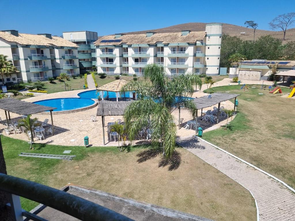 an aerial view of a resort with a swimming pool at Flat Village - Aldeia das Águas F305 in Barra do Piraí