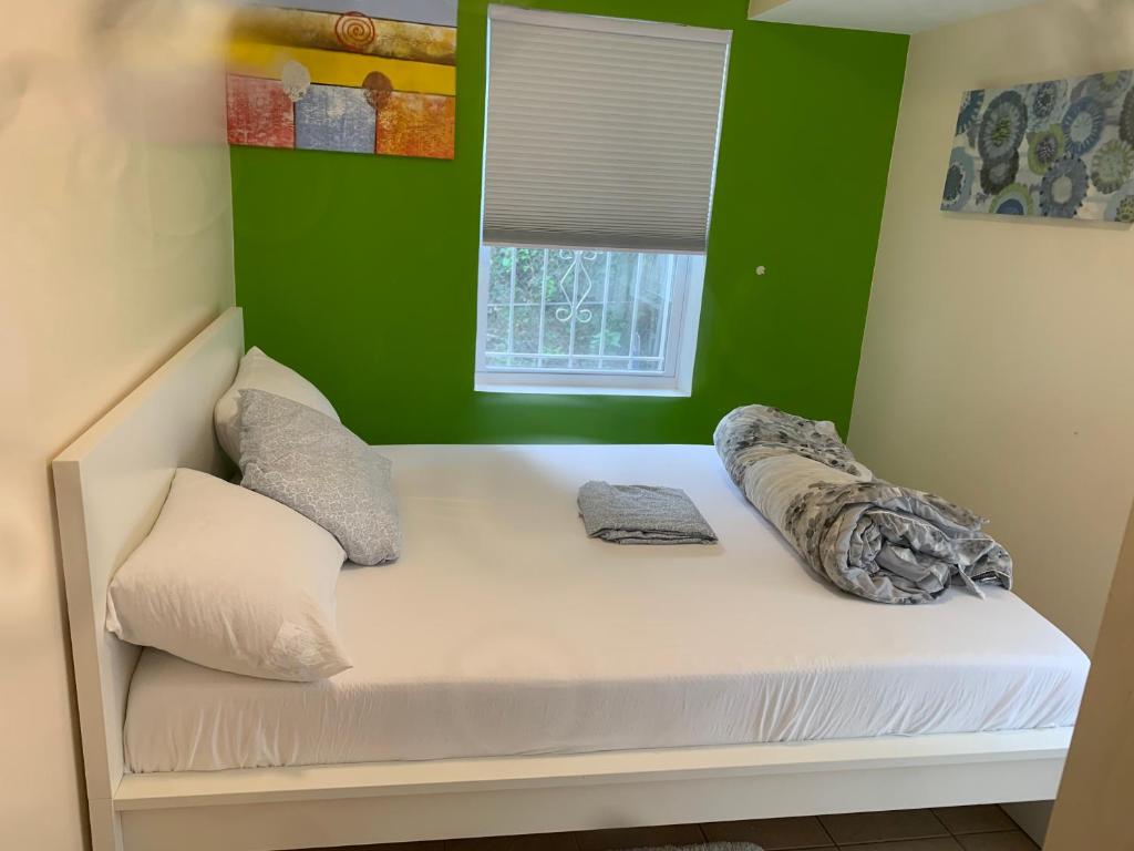 Ένα ή περισσότερα κρεβάτια σε δωμάτιο στο The Green Place of Newark