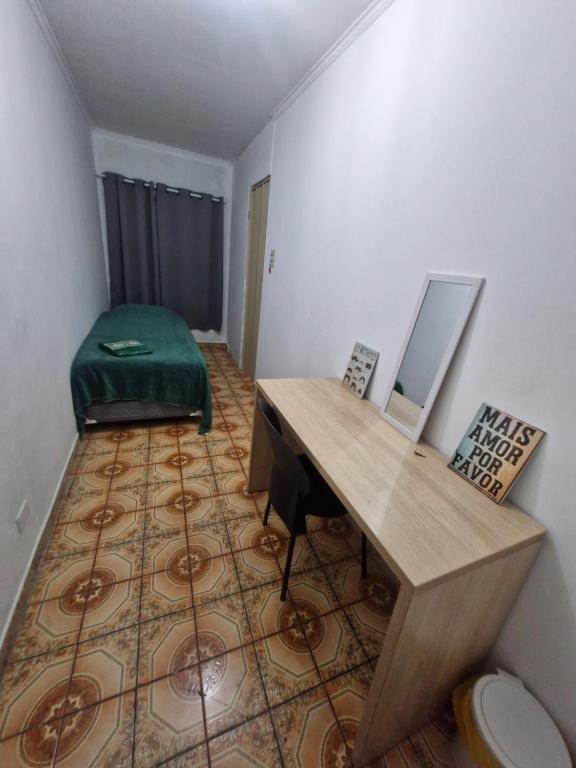 Ένα ή περισσότερα κρεβάτια σε δωμάτιο στο Aurora três