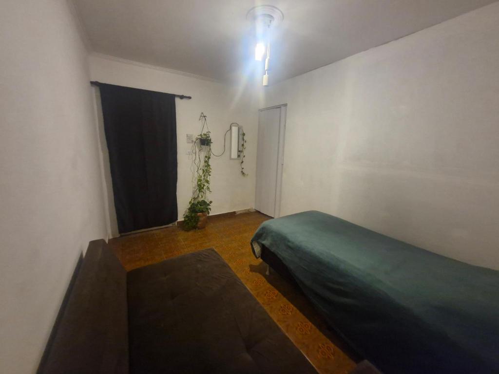 Ένα ή περισσότερα κρεβάτια σε δωμάτιο στο Aurora quatro