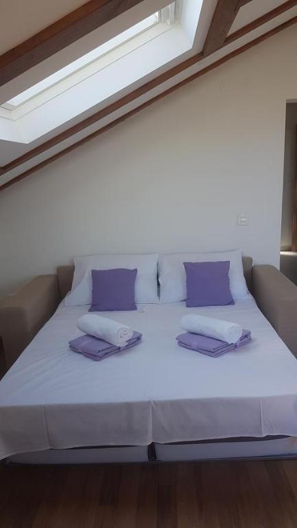 Postel nebo postele na pokoji v ubytování Apartment Azaleja