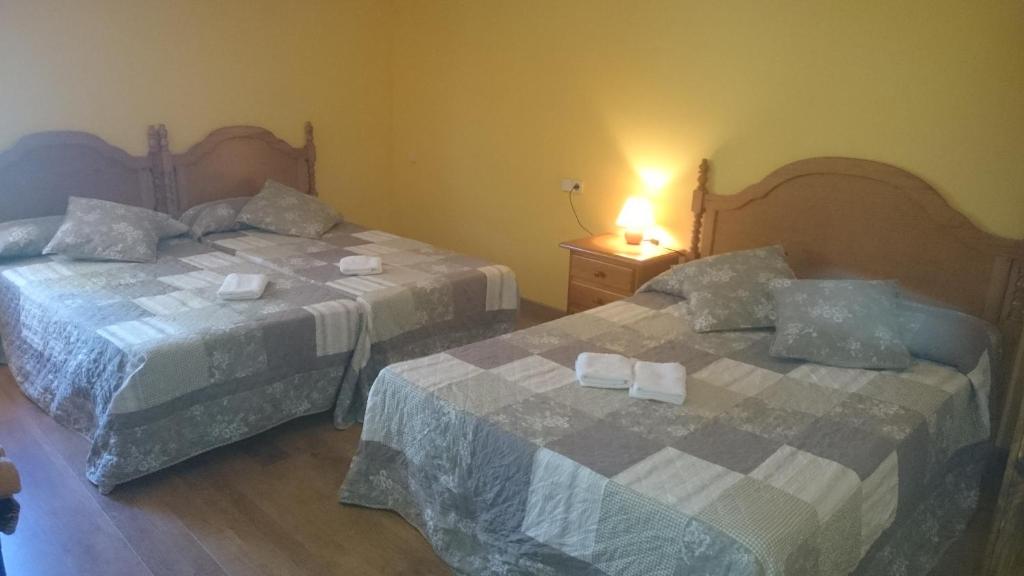 Postel nebo postele na pokoji v ubytování Hostatgeria Falgars