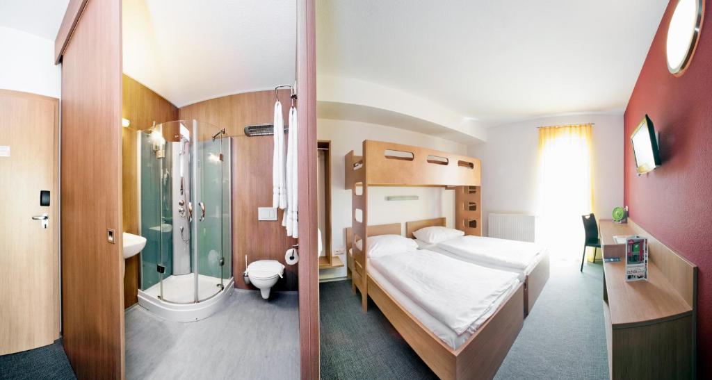 Postel nebo postele na pokoji v ubytování Cleverhotel