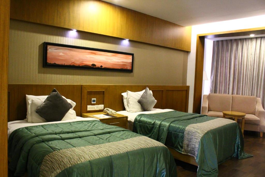 Postel nebo postele na pokoji v ubytování Vgp Golden Beach Resort