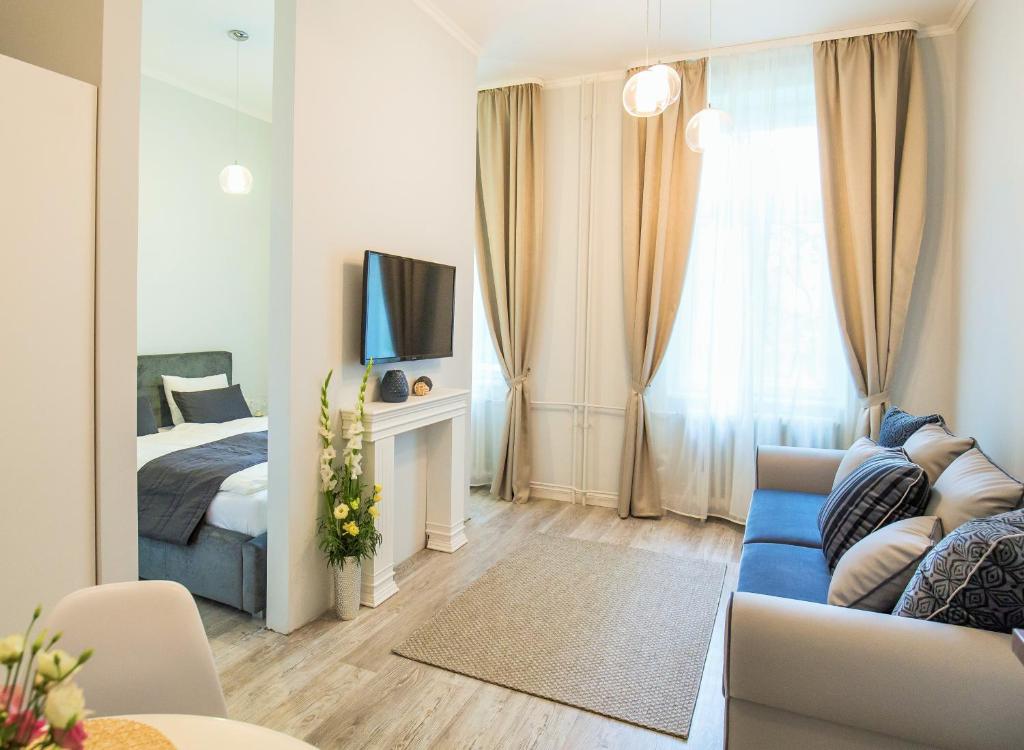 TV a/nebo společenská místnost v ubytování Eden Center Home