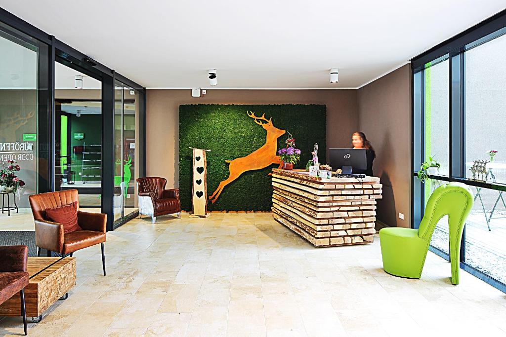 Posezení v ubytování Green Deer Bavarian Hotel