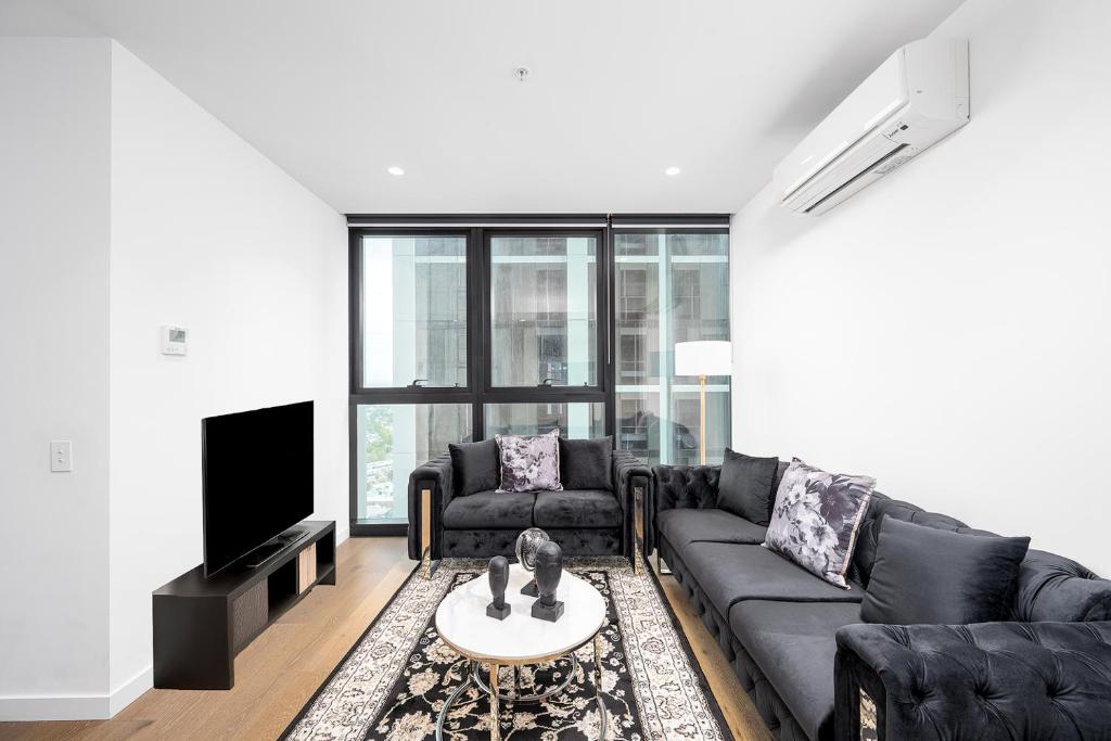 Χώρος καθιστικού στο Melbourne Luxe Retreat 2B2B Pool, Gym 34th floor