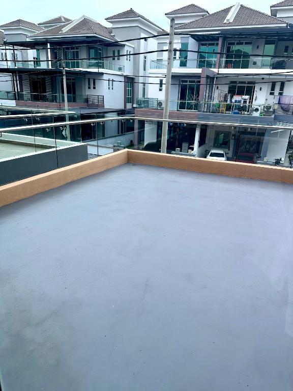 a view of a building from the top of a roof at MU Homestay in Simpang Ampat