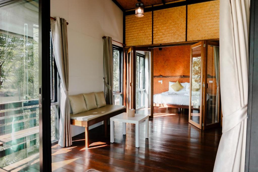 Postel nebo postele na pokoji v ubytování Kunna House