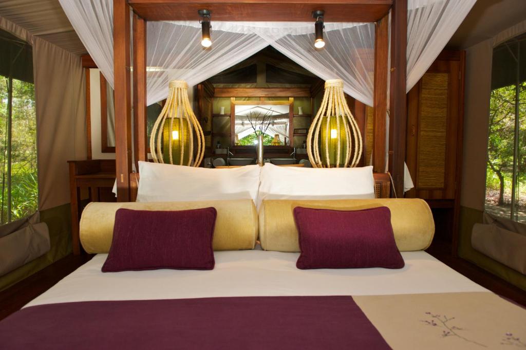 Postel nebo postele na pokoji v ubytování Mara Intrepids Tented Camp
