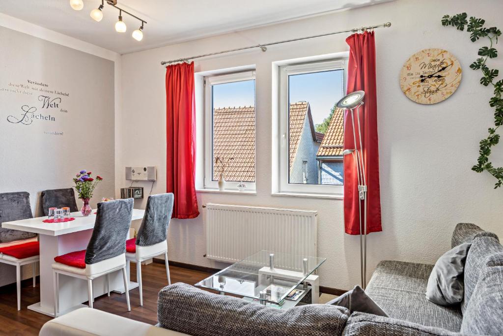 Posezení v ubytování Ferienwohnung Thüringer Wald