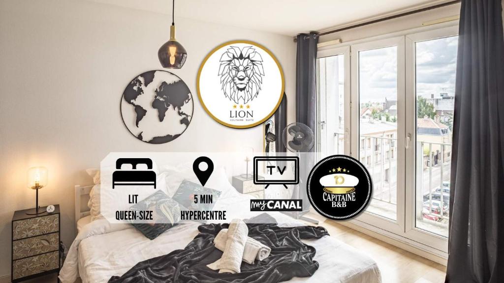a bedroom with posters on the wall and a bed at Voltaire Lion Suite - 5 min Hypercentre in Troyes