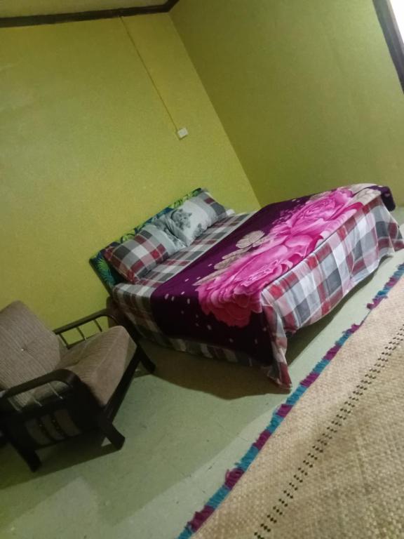 Postel nebo postele na pokoji v ubytování Loa House Homestay