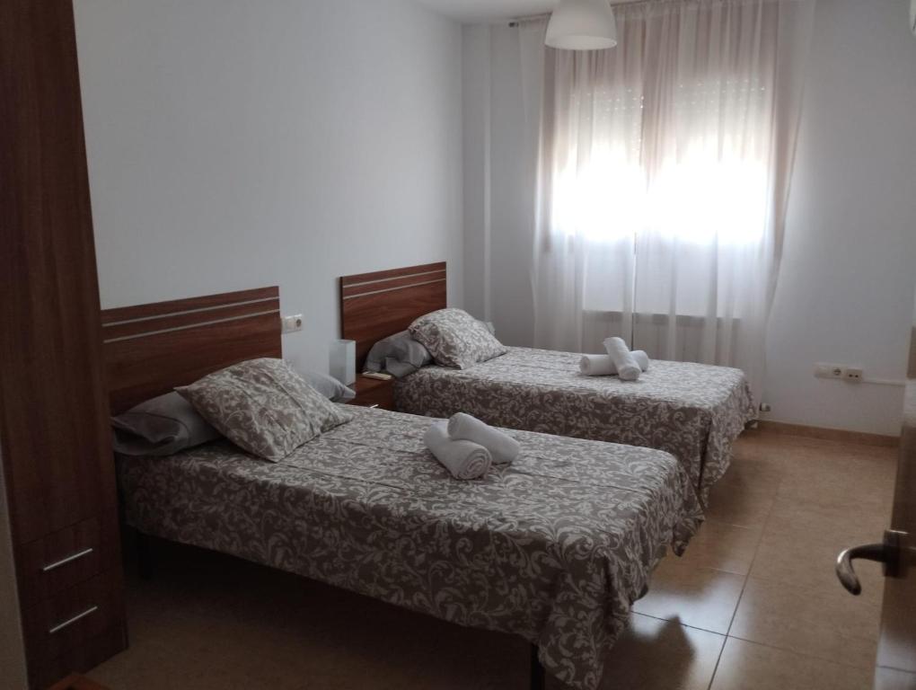 Ένα ή περισσότερα κρεβάτια σε δωμάτιο στο La Parada de Calanda