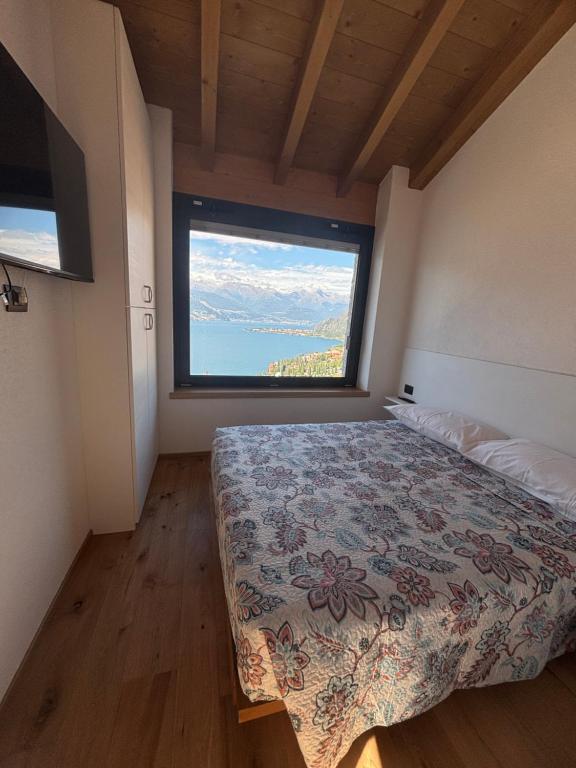 Ένα ή περισσότερα κρεβάτια σε δωμάτιο στο Spigolo Nord