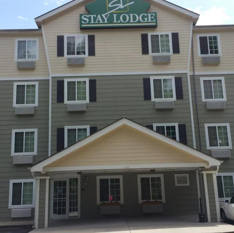 a building with a sign that reads stay lodge at Stay Lodge of Thomasville in Thomasville