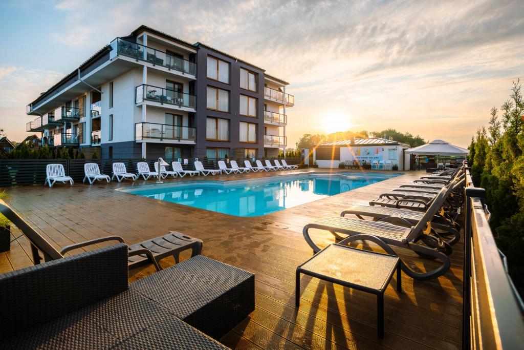 Bazén v ubytování Blu Apartments nebo v jeho okolí