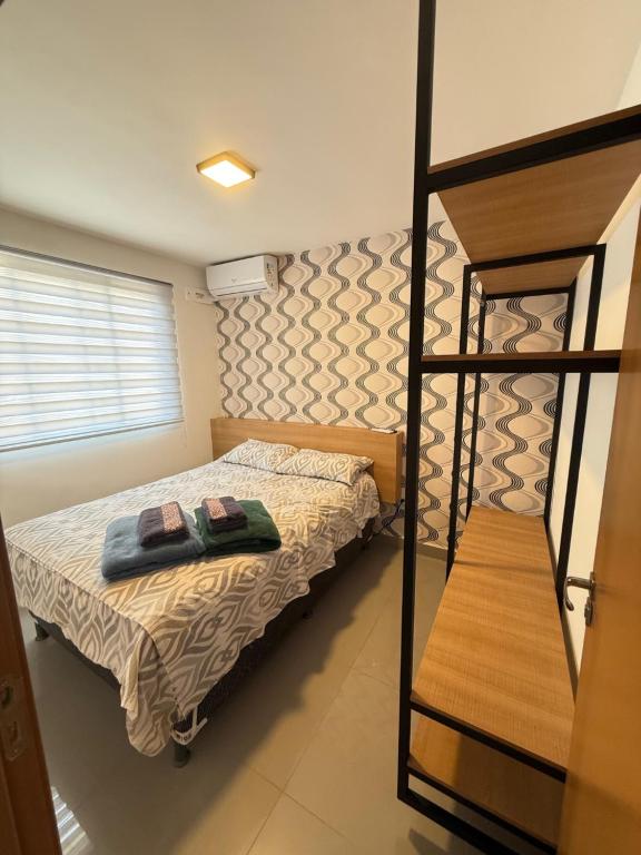Ένα ή περισσότερα κρεβάτια σε δωμάτιο στο Apartamento Completo na Amazônia próx Orla