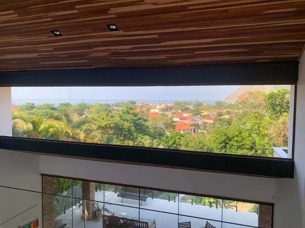 Μπαλκόνι ή βεράντα στο Refúgio com vista mar e verde