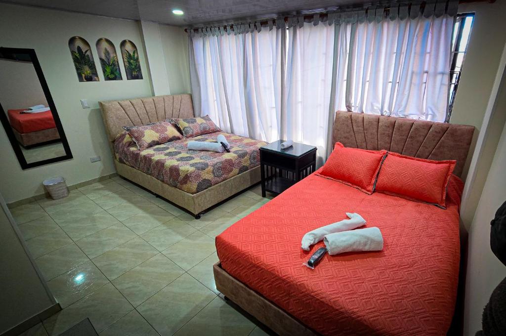 Postel nebo postele na pokoji v ubytování Fly & Stay Bogota APT 1