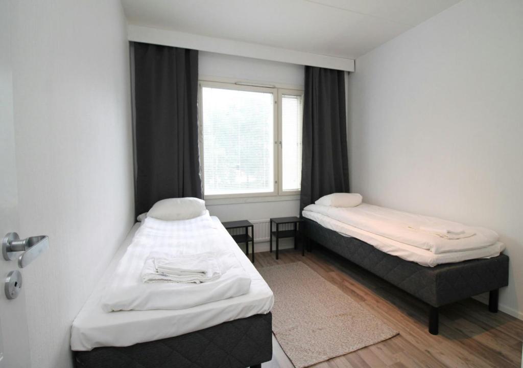 Ένα ή περισσότερα κρεβάτια σε δωμάτιο στο Central and Spacious Apartment for 6
