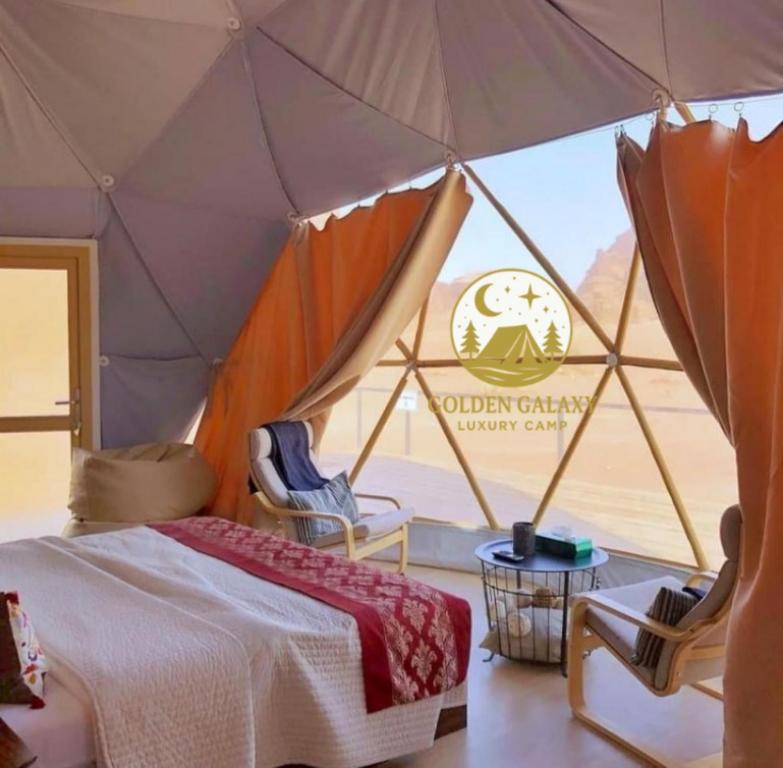 Ένα ή περισσότερα κρεβάτια σε δωμάτιο στο Golden Galaxy Luxury Camp